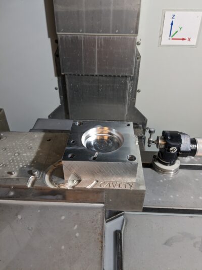 rectangular mold in a clamp in the cnc machine