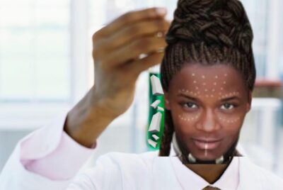 Shuri holding a test tube